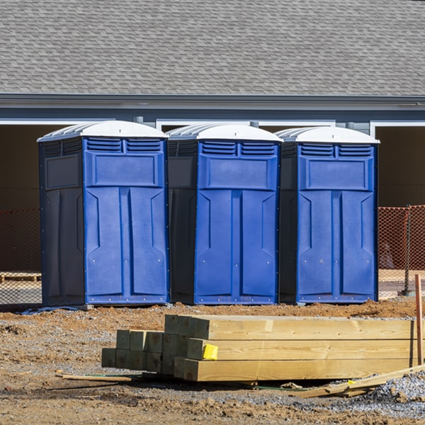 what is the cost difference between standard and deluxe porta potty rentals in South English Iowa